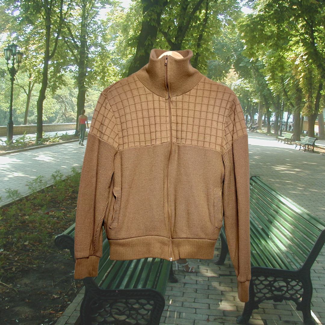 Zipped vintage tan, cozy zip-up jacket with a fuzzy, dark-brown liner. Made in Korea for Montgomery Ward. Good Kid Collective hand-picked this item.