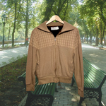 Load image into Gallery viewer, Mostly zipped vintage tan, cozy zip-up jacket with a fuzzy, dark-brown liner. Made in Korea for Montgomery Ward. Good Kid Collective hand-picked this item.
