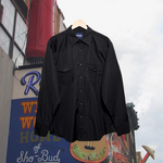 Load image into Gallery viewer, Front of black, western Wrangler button-up shirt w/ black snap buttons and subtle black stripes. Good Kid Collective hand-picked this item.
