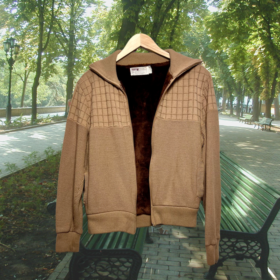 Unzipped vintage tan, cozy zip-up jacket with a fuzzy, dark-brown liner. Made in Korea for Montgomery Ward. Good Kid Collective hand-picked this item.